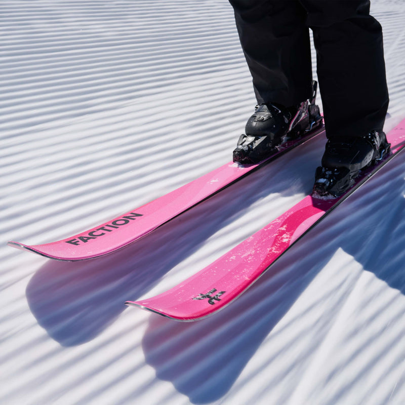 Skier riding pink Faction Dancer 1 piste skis 2026