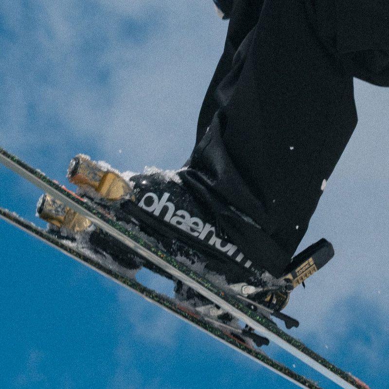 Skier jumping with phaenom fs 02 130 freestyle and allmountain ski boots