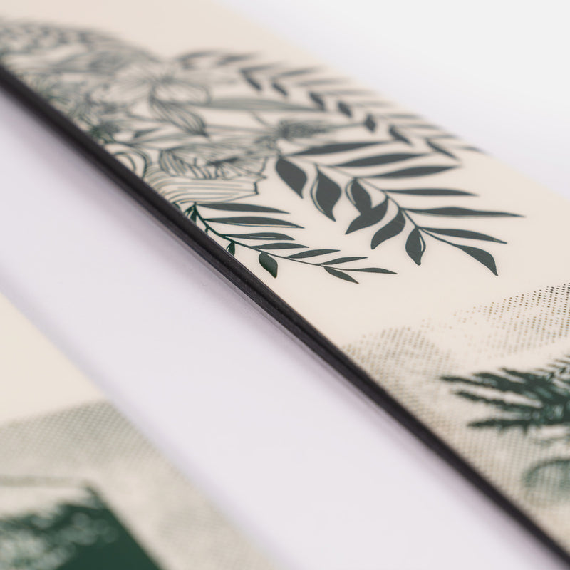 Close-up of Faction Prodigy 2 Capsule, white and green all-mountain ski.