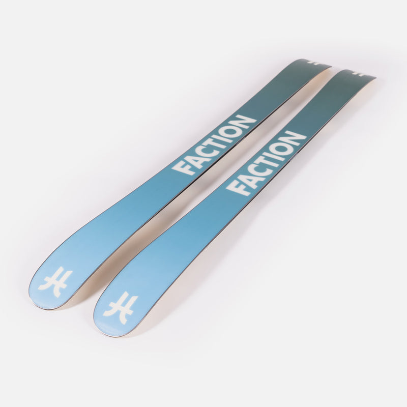 Close-up of Faction Prodigy 2 Capsule, white and green all-mountain ski.
