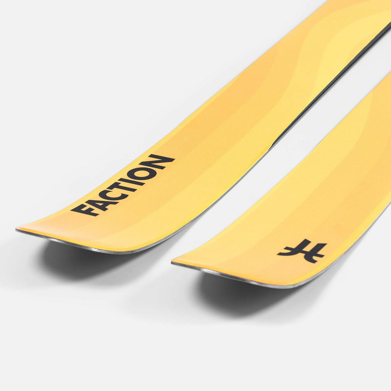 Close-up of yellow Faction Dancer 4 Freeride and Powder skis 2026