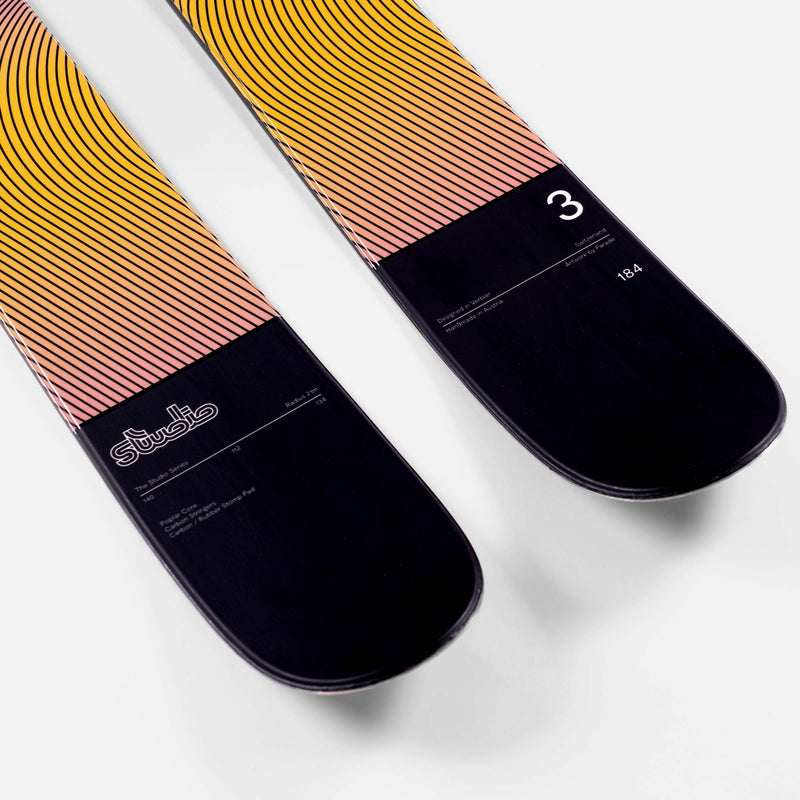 Yellow and purple powder freeride Faction Studio 3 ski close up 2026