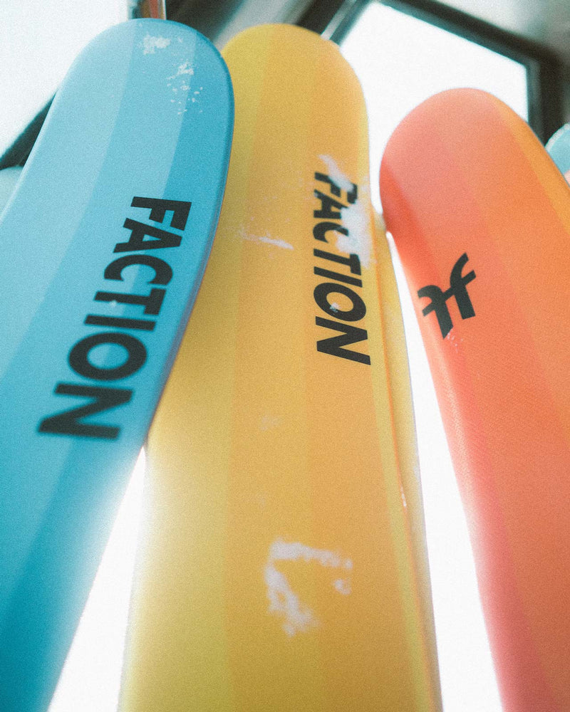 Faction Dancer colorful skis in cabin