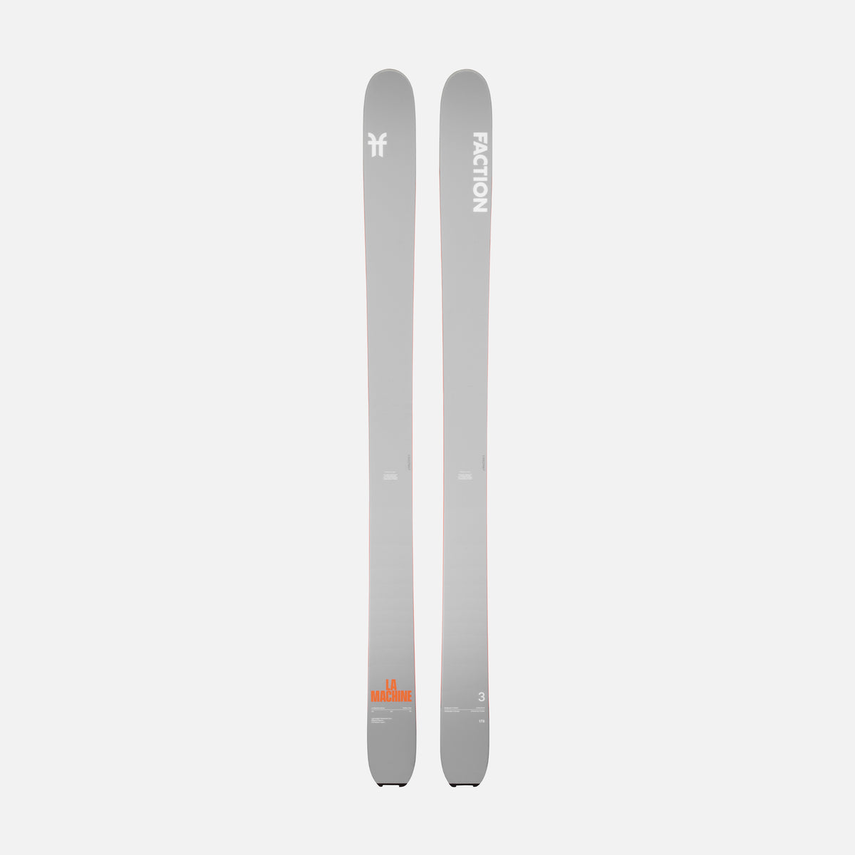 Two gray skis with a Faction logo on a light gray background