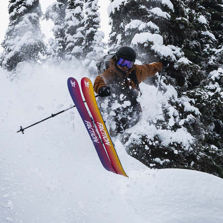 Skier jumping with colorful Faction Studio skis